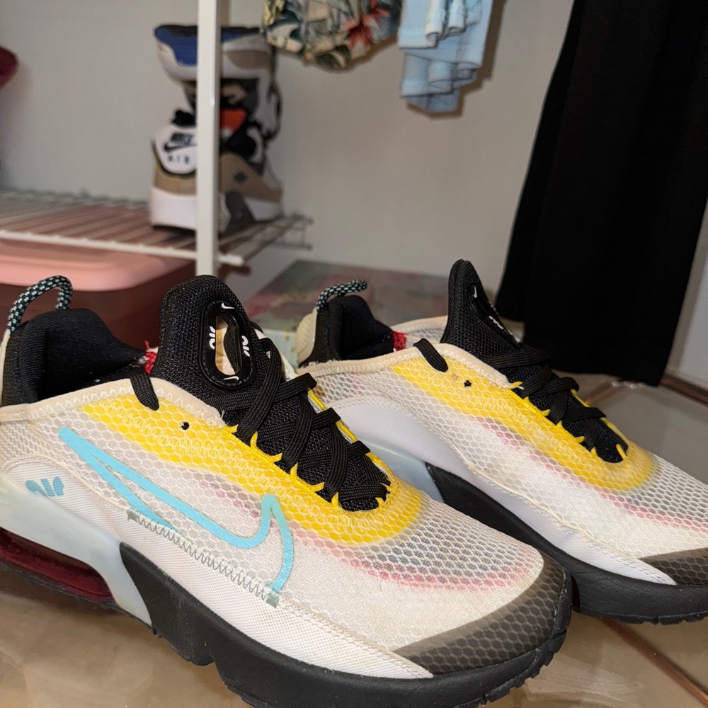 Nike Black and Yellow Sneakers with Modern Design